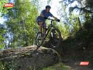 Dropping off a bolder on one of Chamonix's high singletrack trails